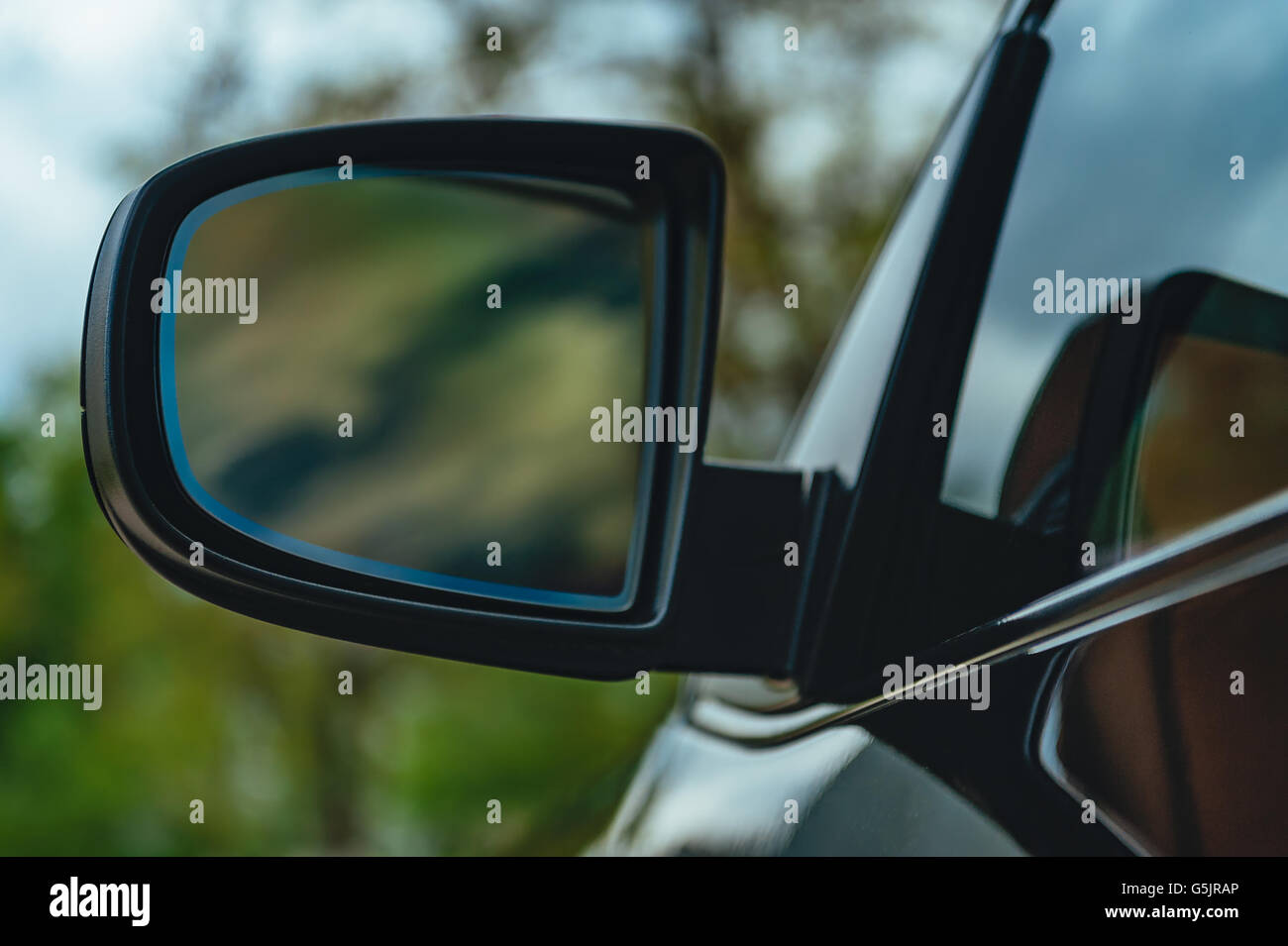 Reflection In Black Elite Car Mirror Stock Photo - Alamy