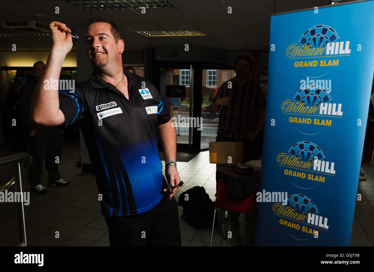 Darts - Grand Slam of Darts Promotion Event - Wolverhampton. Dean Winstanley pictured at the William Hill shop in Wolverhampton Stock Photo