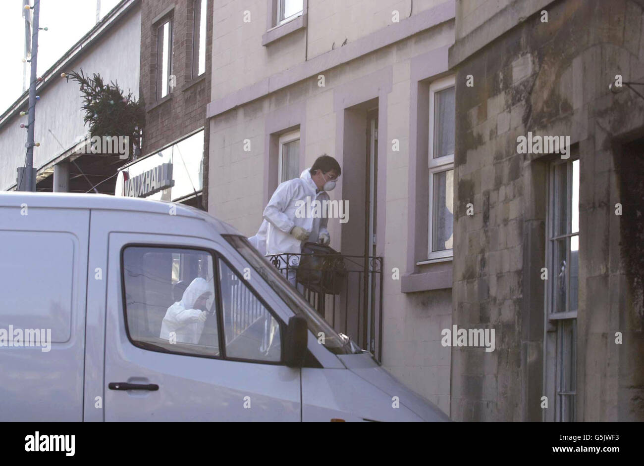 Forensic officers at the scene of the shooting in Chippenham, Wiltshire, in which one man died