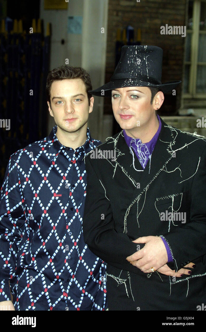 Culture Club's Boy George (R) with Euan Morton during a photocall in London, where it was announced that Morton will make his West End debut, when he plays a singer/DJ in Taboo, a musical with music and lyrics by George based on the 80's pop era. Stock Photo