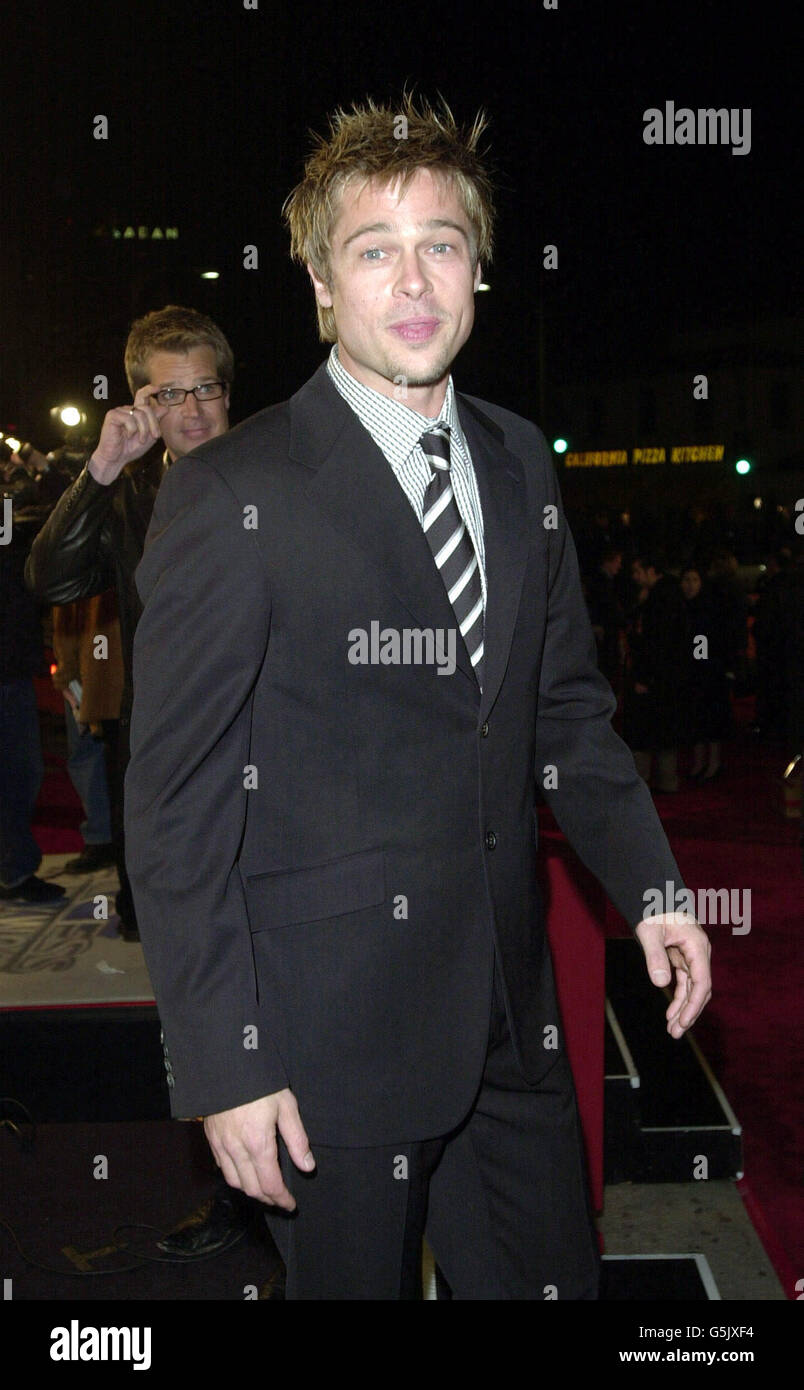 Actor Brad Pitt arrives for the premiere of his latest movie Ocean's Eleven at Mann's Village Theatre in Los Angeles. * 19/03/2003: The ultimate male screen sex symbol would have the smile of Tom Cruise with a 66% vote and the eyes of Robert Redford according to 43%. George Clooney's salt and pepper thatch was judged the best hairdo by 32% of those polled.53% opted for the body of Brad Pitt with 25% requesting Patrick Swayze's bottom. A number of older stars completed their ultimate male, with Jack Nicholson's sex appeal pulling in a 63% vote. And, according to 28%, Woody Allen's humour would Stock Photo