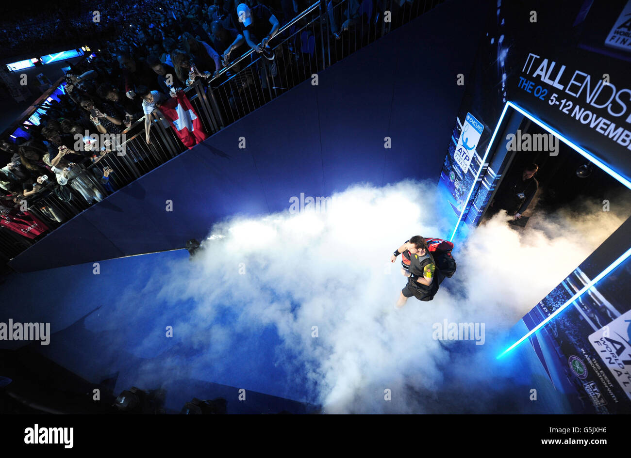 Great Britain's Andy Murray walks out onto court to face Switzerland's Roger Federer during the Barclays ATP World Tour Finals at the O2 Arena, London. Stock Photo