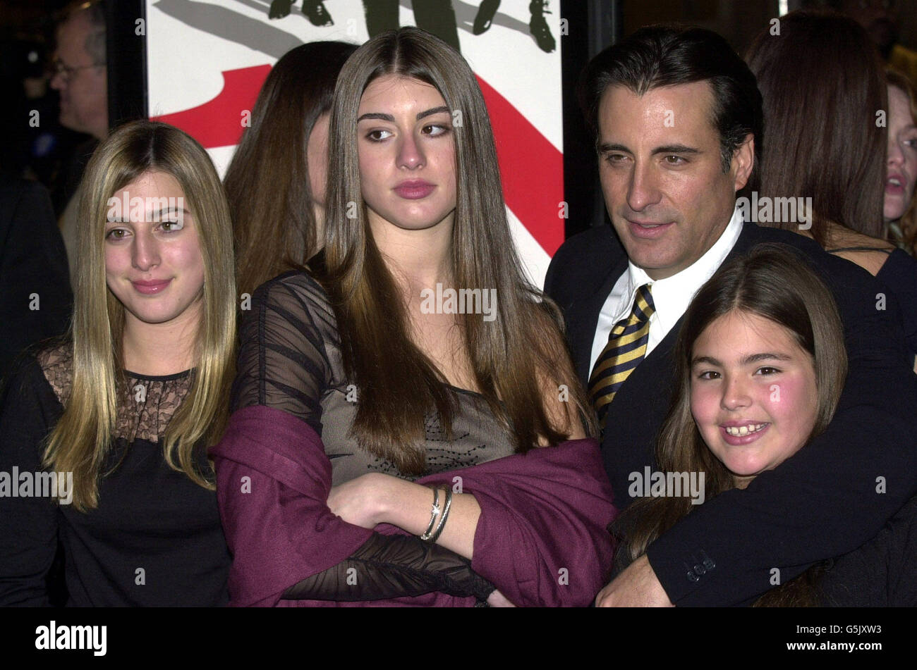 Actor Andy Garcia with daughters arrives to to the world premiere of Ocean's Eleven at the Mann's Village theatre in Los Angeles. Stock Photo