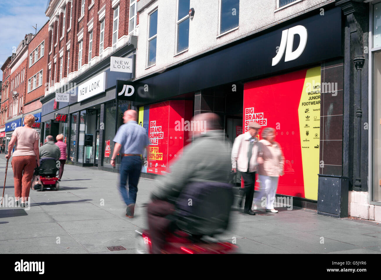 JD Sports  Shops and Shoppers in the retail sector of the  Victorian Town of Southport, in Merseyside, UK Stock Photo