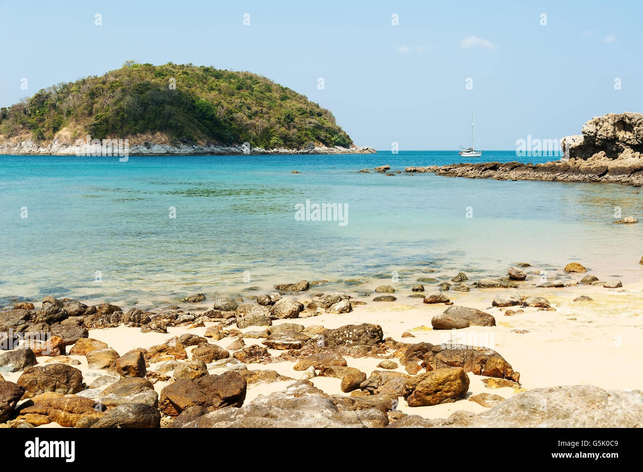 Blue sea with shape of rock and blue sky background, Summer and travel concept Stock Photo