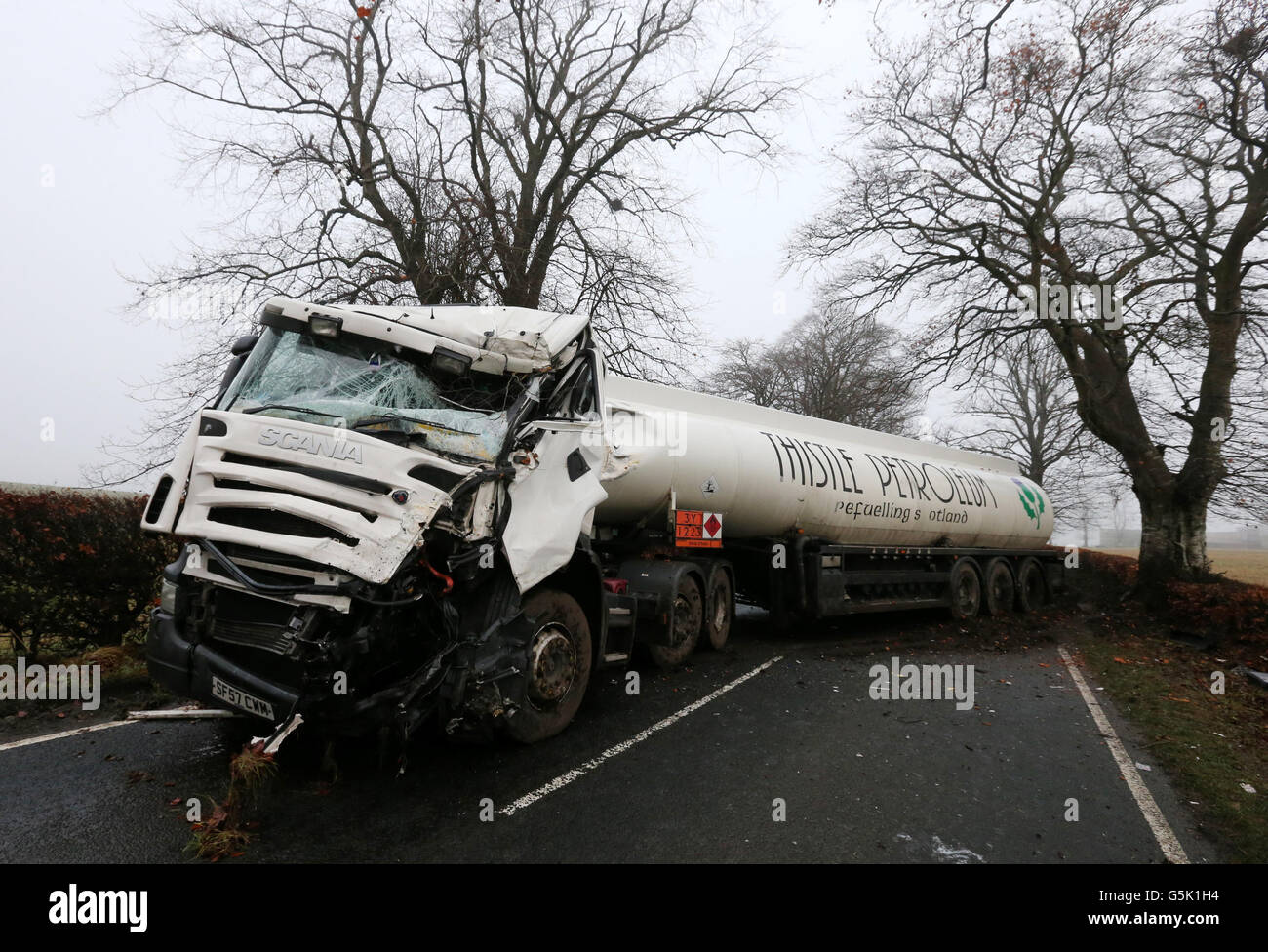 A petrol tanker blocks the A811 near Kippen this morning after it hit a tree and jackknifed across the road.The driver escaped uninjured. Stock Photo