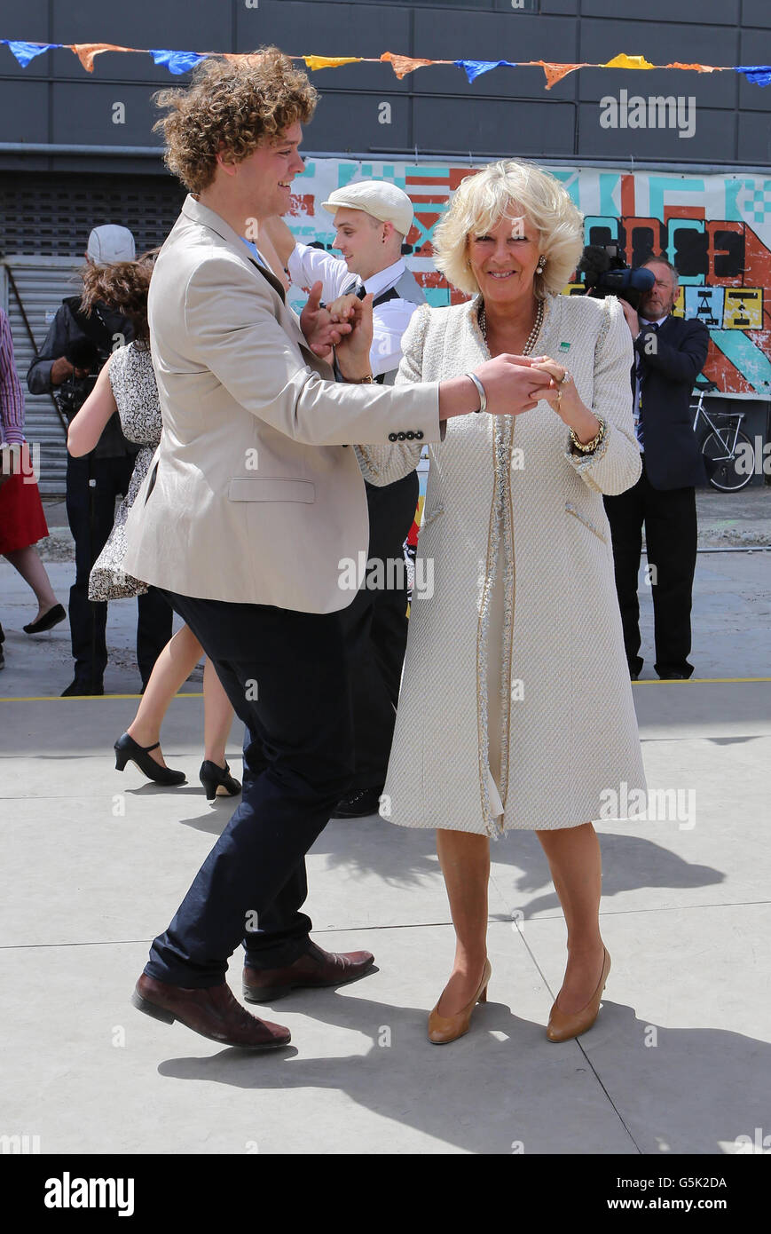 The Duchess of Cornwall dances with Sam Johnson from Christchurch