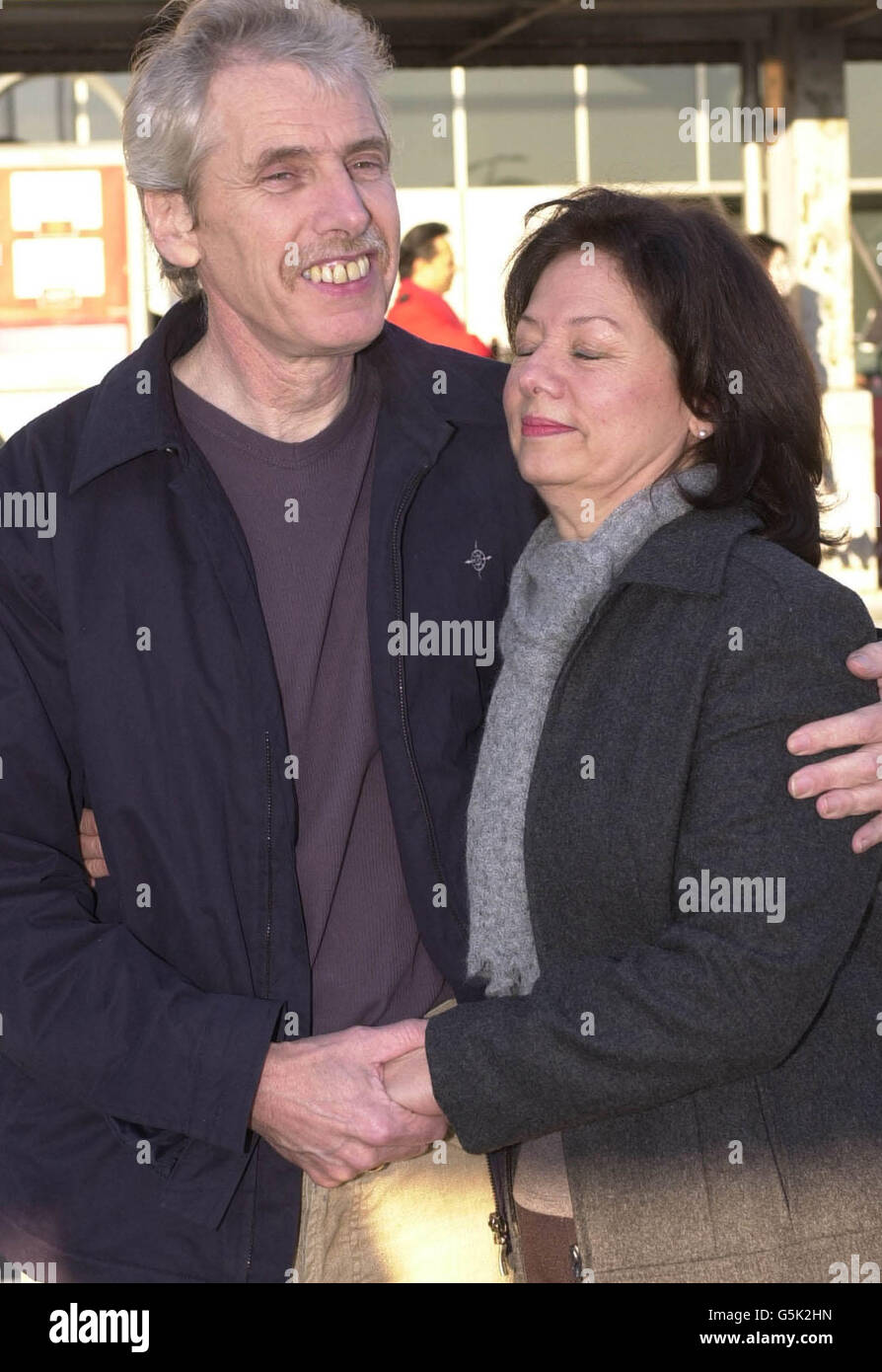 British Plane spotter, Peter Norris, 52, of Uxbridge, west London reunited with his wife Perdita at Heathrow Airport, from Athens after being held in captive for five weeks in a Greek Prison. * The group of twelve plane spotters had been arrested for allegedly taking photos of a military base during an air show in the town of Kalamata. The group will have to return to Greece to stand trial on allegations of gathering secret informationafter judges dropped the spying charges. Stock Photo