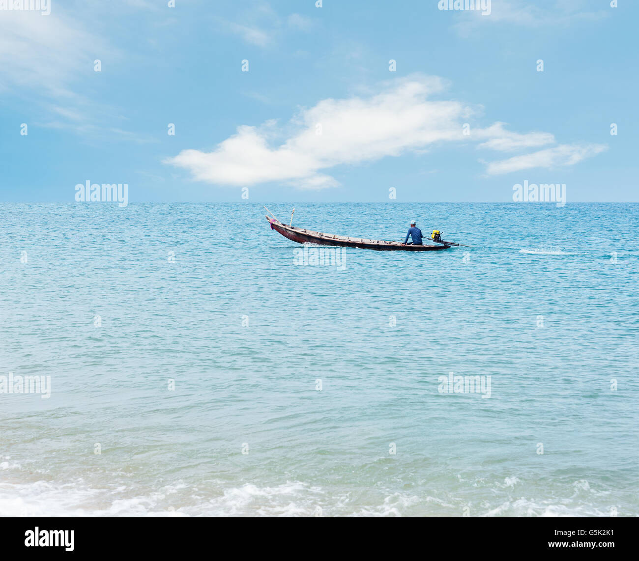 Blue sea with blue sky and white cloud and fishing boat Stock Photo - Alamy