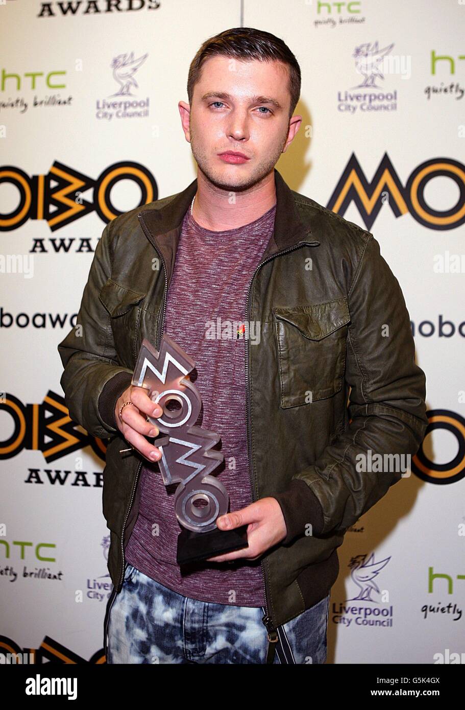 Ben Drew aka Plan B with the award for Best Grime/Hip Hop Act, at the MOBO Awards 2012, at the Echo Arena, Liverpool. Stock Photo