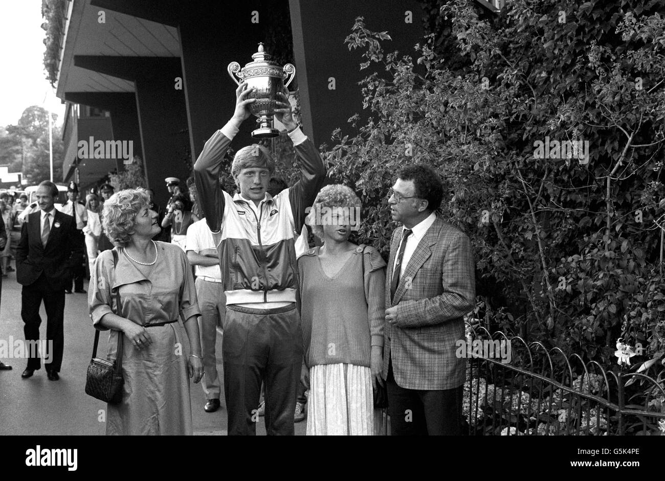 The Wimbledon men's singles champion, Boris Becker, with his family after winning the title by defeating Kevin Curren6-3 6-7 7-6 6-4 in three hours 19 minutes. His center court victory put him in the record books for being the first unseeded player, and, at 17, the youngest to win the title. Stock Photo