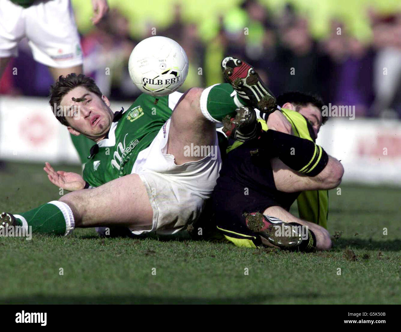 Burton v Yeovil - Burton's Pat Lyons and Yeovil's Ben Smith get tangled up in the Burton v Yeovil game at Coventry.. NO UNOFFICIAL CLUB WEBSITE USE. Stock Photo