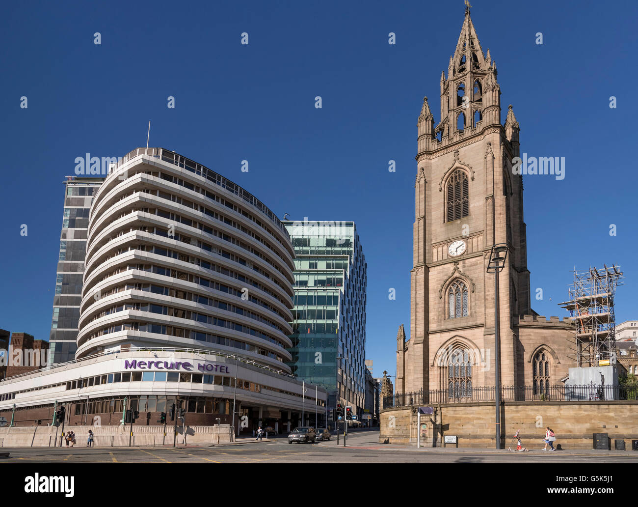 Liverpool Merseyside North West England. The Mercure hotel , formerly the Atlantic Tower and St. Nicholas' parish church Stock Photo