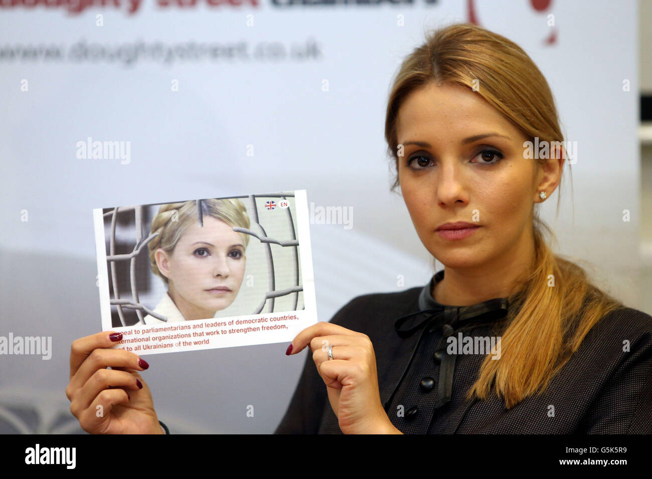 Eugenia Tymoshenko holds a photograph of her mother and former ...