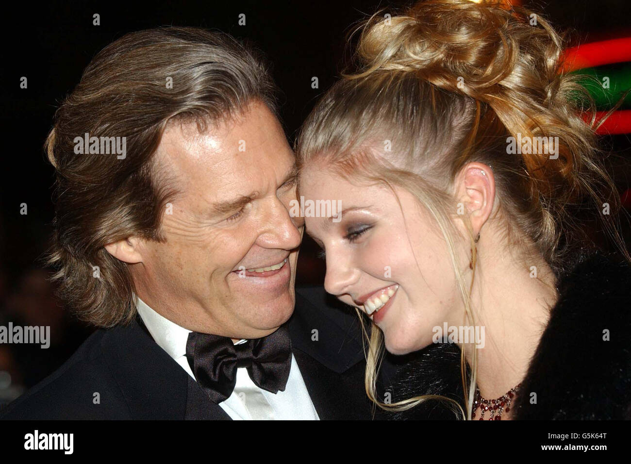 Actor Jeff Bridges accompanied by his daughter Isabelle arrives for the London Film Festival's closing gala premiere of his new film K-Pax at the Empire in Leicester Square, London. * ..... The film follows the story of a mysterious hospital patient who claims to be from another planet. lllll Stock Photo