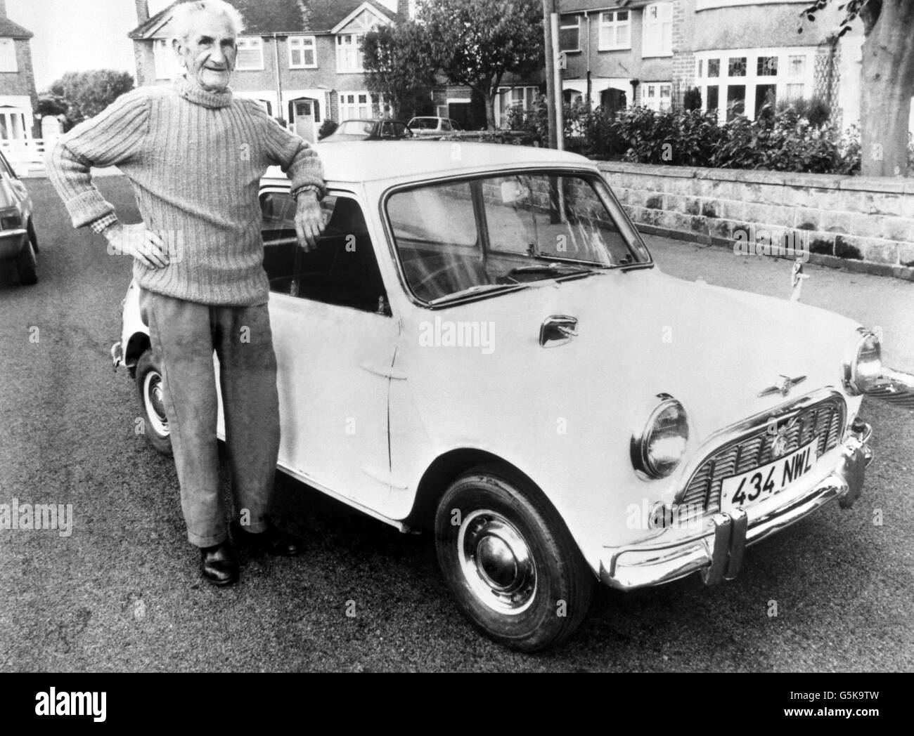 Bernard Ferriman, 83, with his Oxford Mini, the first 850cc model ever built and a pre-production model specially made by the car's inventor Sir Alec Issigonis, which is to be auctioned in a Top Car Sale at British Car Auctions, Farnborough. Stock Photo