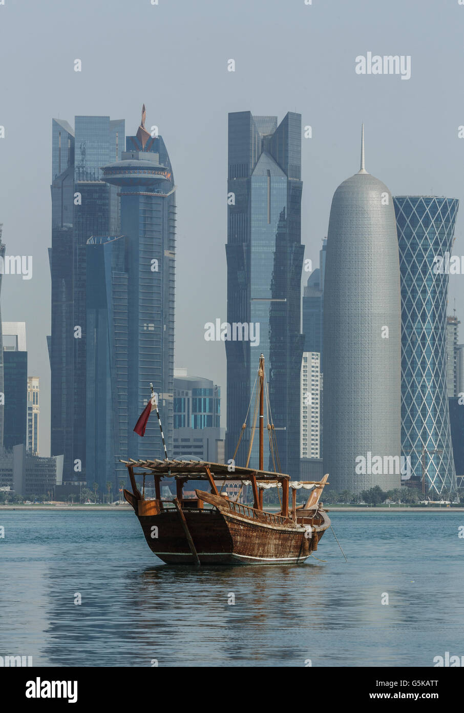 Boat floating near Doha skyline, Doha, Qatar Stock Photo Alamy