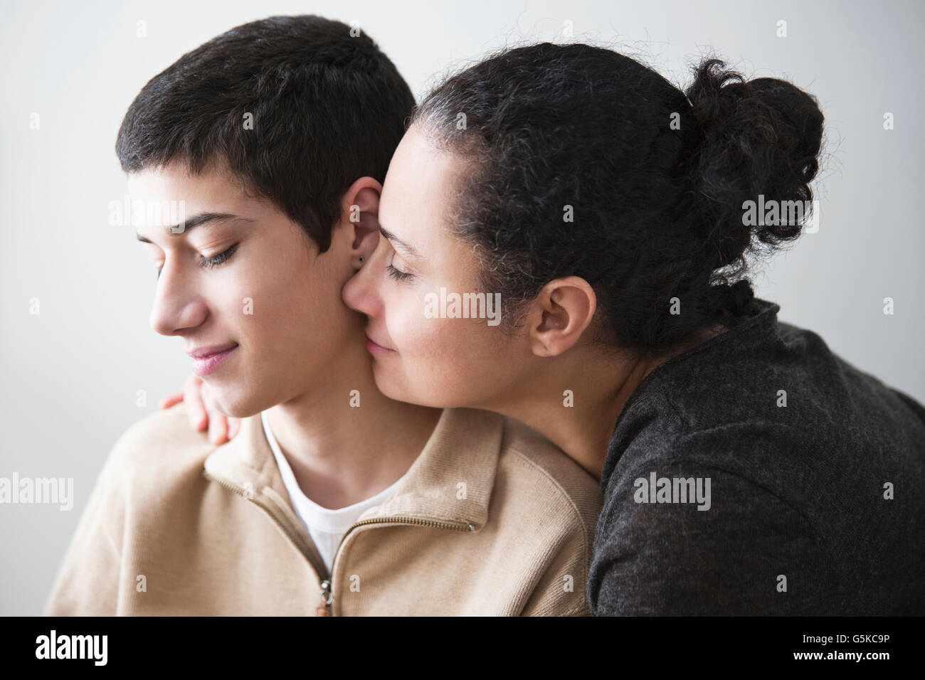 Close up of mother hugging son Stock Photo