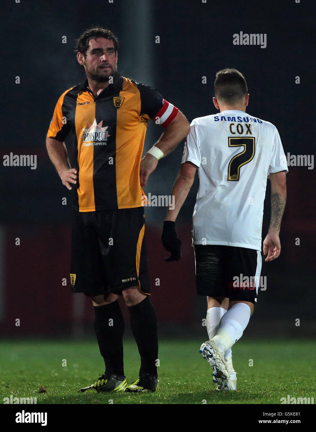 Gloucester City captain Matt Coupe shows his dejection after his error leads to to the 2nd Leyton Orient goal during the FA Cup First Round match at Whaddon Road, Gloucester. Stock Photo