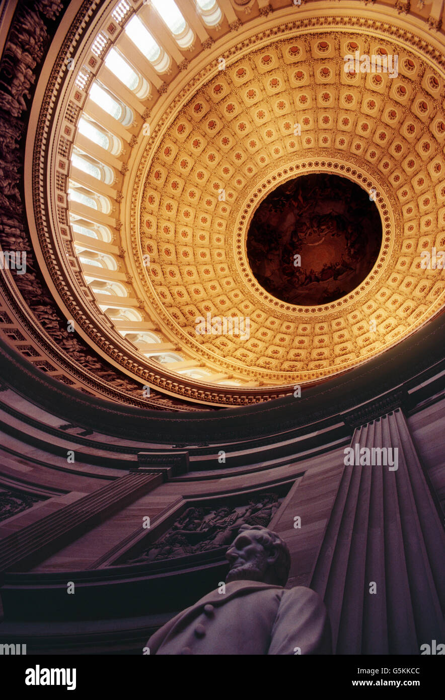 Interior view of the United States of America Capital Rotunda dome; Washington D. C. Abraham Lincoln statue foreground Stock Photo