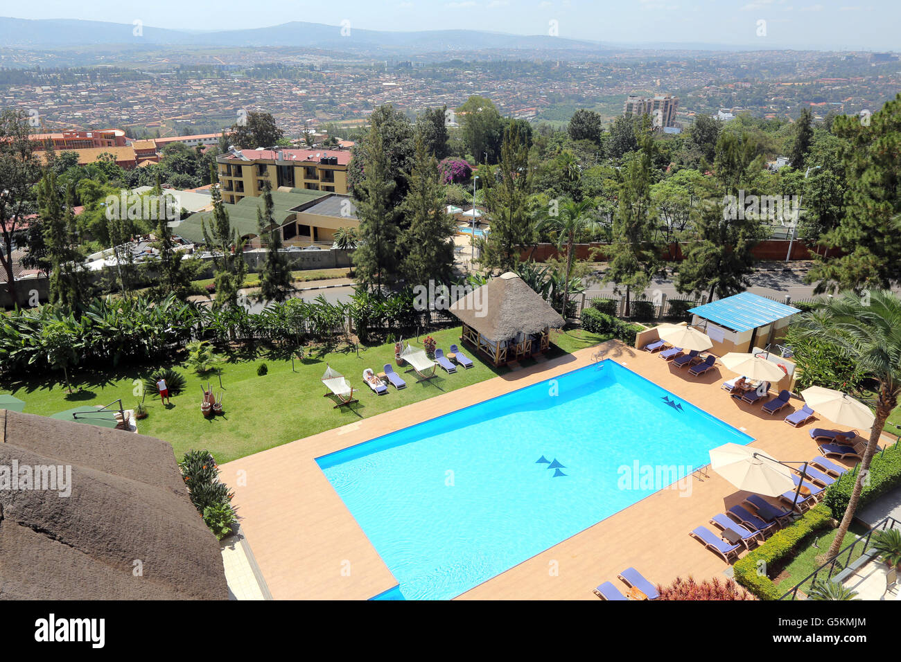 Kigali, Rwanda, Africa -  View from top of the 'Hôtel des Mille Collines' to the pool site and garden of the Hotel. Hôtel des Mille Collines made famous in the movie 'Hotel Rwanda', it is the place where terrified Tutsi's took refuge during the 1994 genocide. Stock Photo