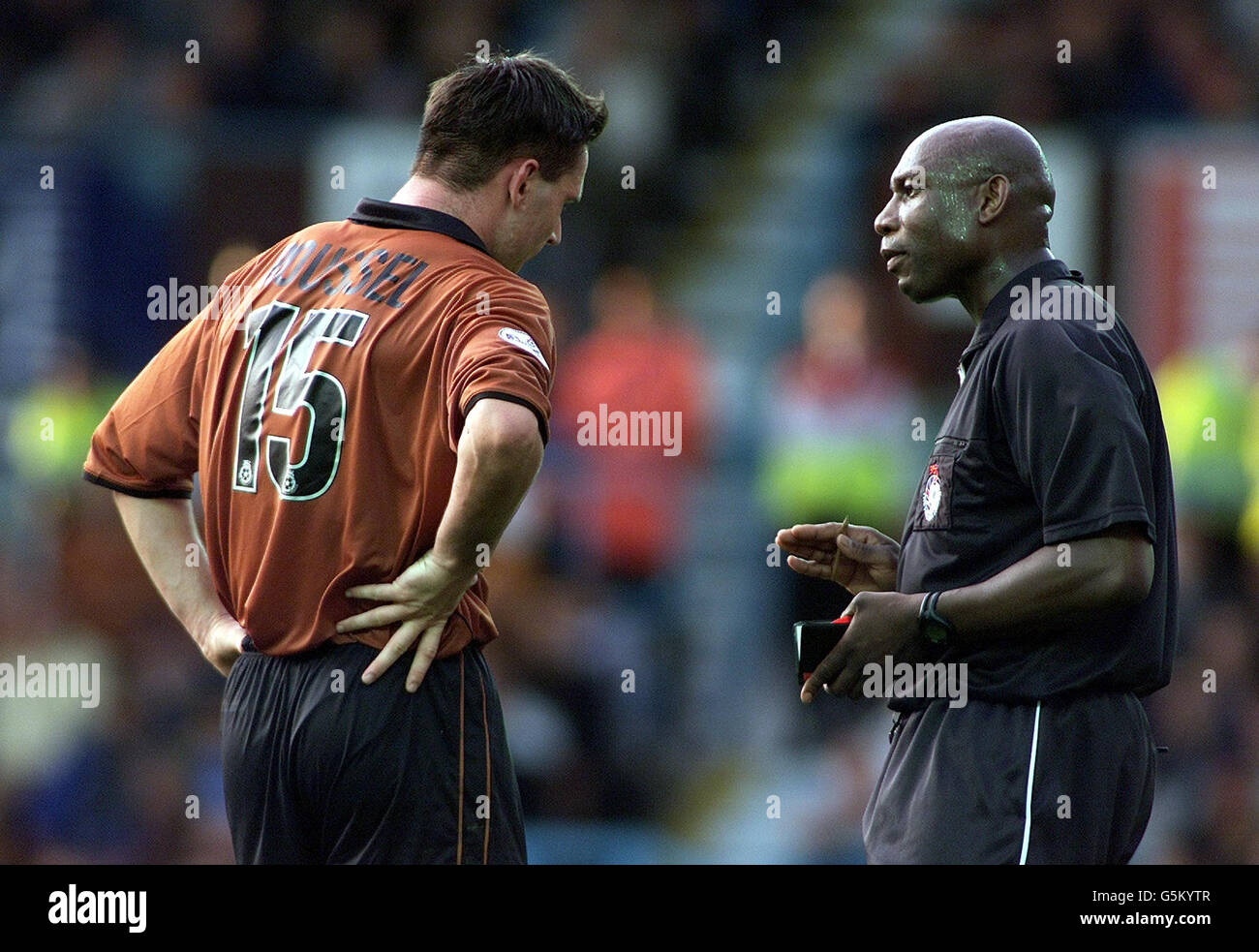 Referee Uriah Rennie cautions Cedric Roussel, during the match against Coventry at Highfield Road in the Nationwide League Division One. NO UNOFFICIAL CLUB WEBSITE USE. Stock Photo