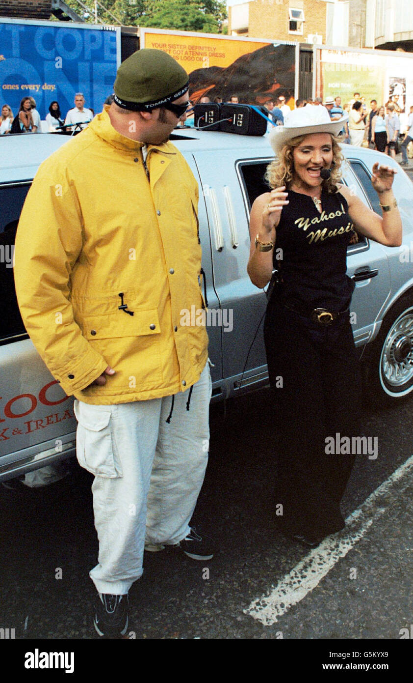 Ali G and Madonna lookalikes entertain the crowds before pop queen Madonna  celebrates American Independence Day by kicking off the UK leg of her  Drowned World tour with a spectacular show at