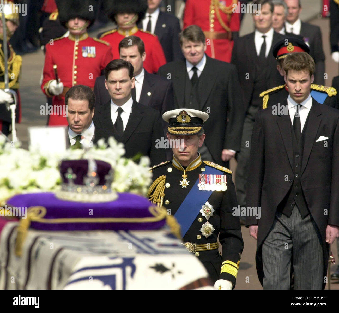 Members of the Royal Family including the Prince of Wales, Prince William, Viscount Linley and Daniel Chatto follow on behind the coffin of Queen Elizabeth, the Queen Mother, during the procession from the Queen's Chapel for Westminster Hall, * where she will lie-in state until her funeral at Westminster Abbey on Tuesday. Stock Photo