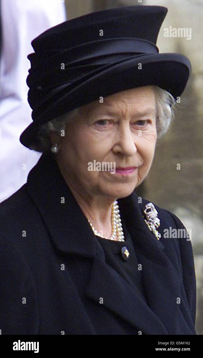 Queen Elizabeth II waits outside Westminster Hall following the ceremonial procession of the Queen Mother at Westminster Hall in central London. Thousands of mourners lined the route to pay their last respects to the Queen Mother who died aged 101. * Her funeral will take place on April 9 after which she will be interred at St George's Chapel in Windsor next to her late husband King George VI. Stock Photo