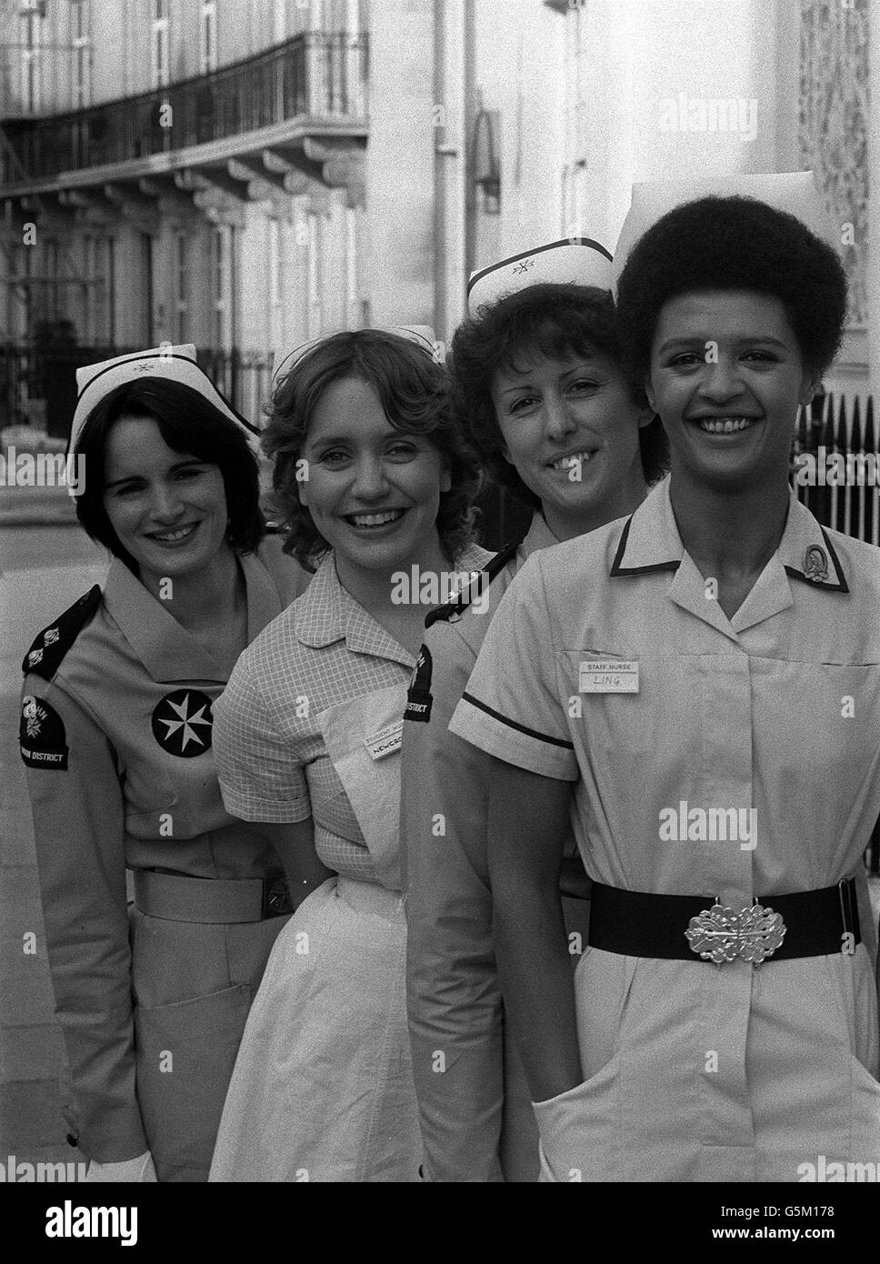 PA PHOTOS 23/10/1979 Real-life St. John nurses from left to right: Linda Dominguez and Sheila Jackson are joined by actresses Joanna Monro amd Angela Bruce, (far right) who star as nurses in the BBC series 'Angels' to launch the St. John Year of Nursing 1980, in London Stock Photo