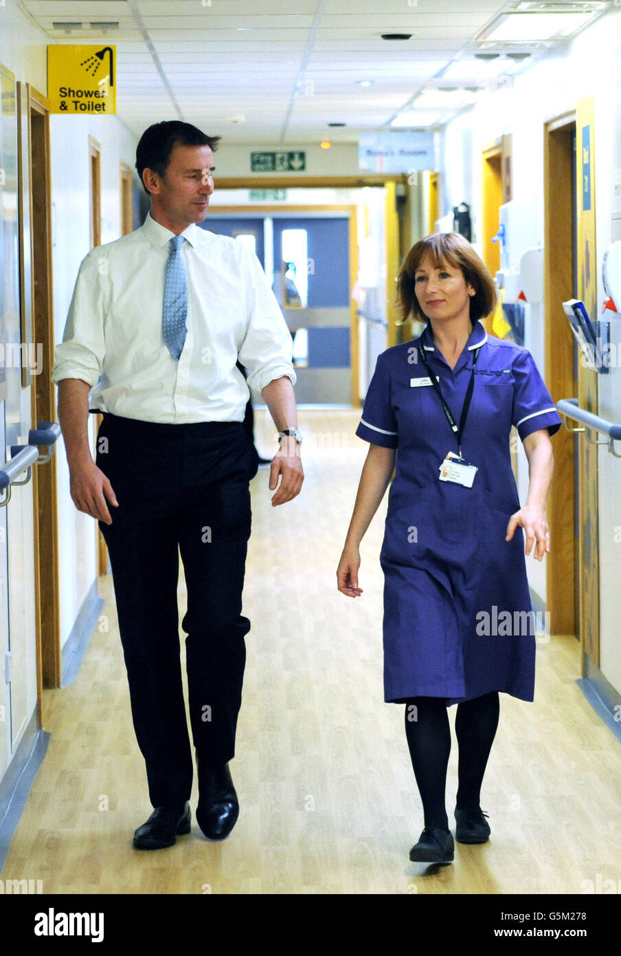 Health Secretary Jeremy Hunt meets matron Lisa de Jonge on the Marjory Warren ward at Kings College Hospital in London today. The ward is part of the Health and Ageing unit which assesses, treats and rehabilitates the elderly. Stock Photo