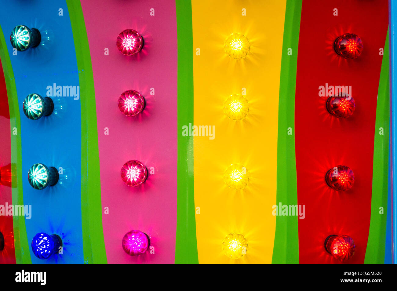 The colored lights on a fairgound ride Stock Photo Alamy