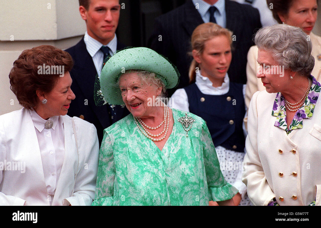 The Queen Mother is joined by the Queen and Princess Margaret outside Clarence House on her 93rd birthday. * 15/02/02 The Queen Mother with Princess Margaret - the yoounger sister of Britain's Queen Elizabeth II - who died, aged 71, last saturday. Her funeral, being held later today at St George's Chapel, Windsor, is a doubly-poignant occasion for the 101-year-old Queen Mother. The funeral of her younger daughter takes place on the 50th anniversary of her husband King George VI's burial at the same chapel on February 15, 1952. Stock Photo