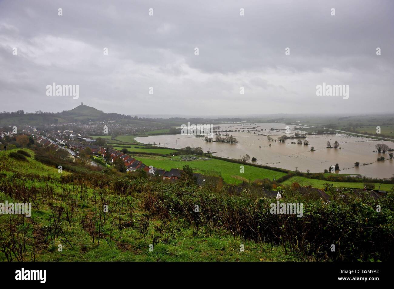 The flooded Somerset Levels as heavy rain continues to fall on already drenched fields and swollen rivers in the area. Stock Photo