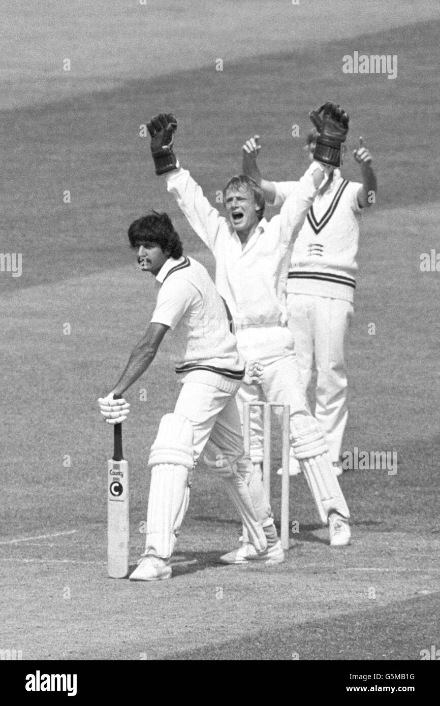 Northamptonshire's Sarfraz Nawaz LBW for four, as Middlesex wicket keeper Paul Downton (gloved) and captain Mike Brearley appeal during the second day's play of the 3-day Schweppes Championship match at Lord's in London. Stock Photo