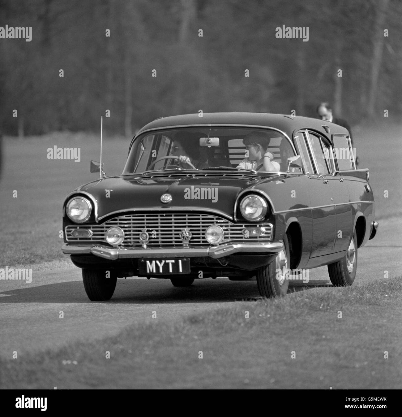 Queen Elizabeth II at the wheel of her Vauxhall Cresta car in Windsor