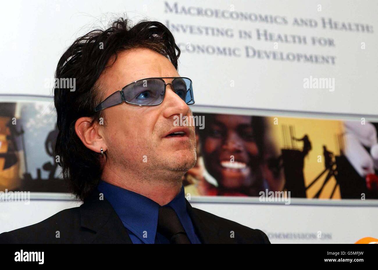 U2 frontman Bono during a photocall in London, to launch a new blueprint for global health policy, which calls for greater medical investment to help the world's poor. Stock Photo