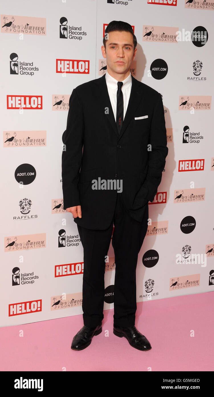 Reg Traviss arrives at the Amy Winehouse Foundation Ball in London . Stock Photo