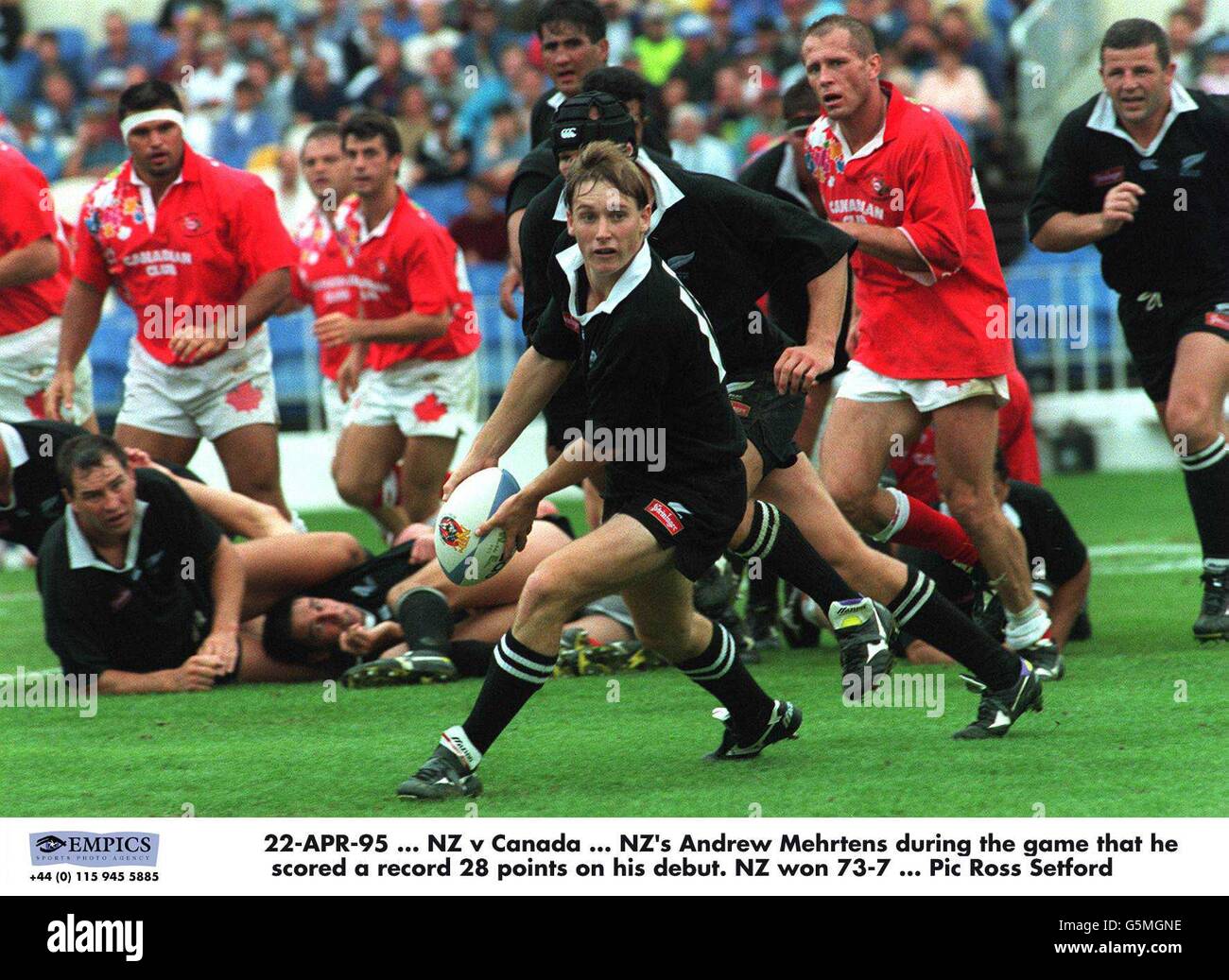 22-APR-95 ... NZ v Canada ... NZ's Andrew Mehrtens during the game that he scored a record 28 points on his debut. NZ won 73-7 Stock Photo