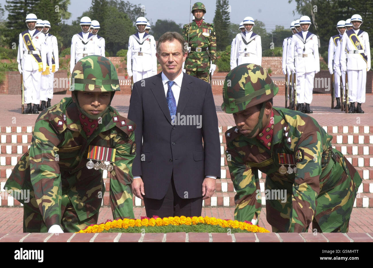 British Prime Minister Tony Blair lays a wreath at a memorial in Dhaka, Bangladesh, for the 3 million martyrs who died in the 1971 Bangladeshi war of Independence. * Later Mr and Mrs Blair were flying on to Bangalore, southern India, which is the centre of the country's IT and telecommunications industry. Stock Photo