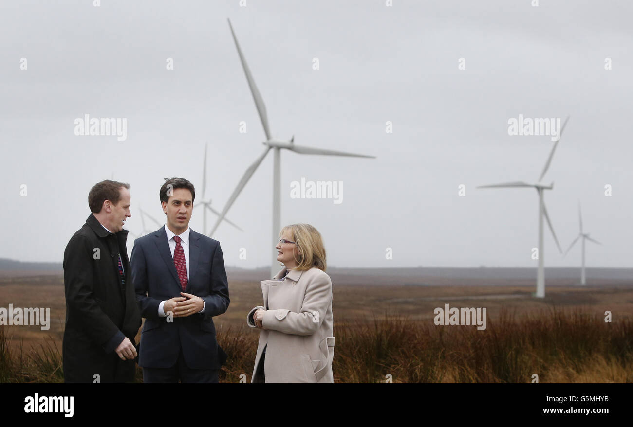 Labour leader Ed Miliband is pictured with the Chief Executive of Scottish Power Renewables Keith Anderson and Shadow Scottish Secretary Margaret Curran during a visit to Whitelee wind farm in Scotland. Stock Photo