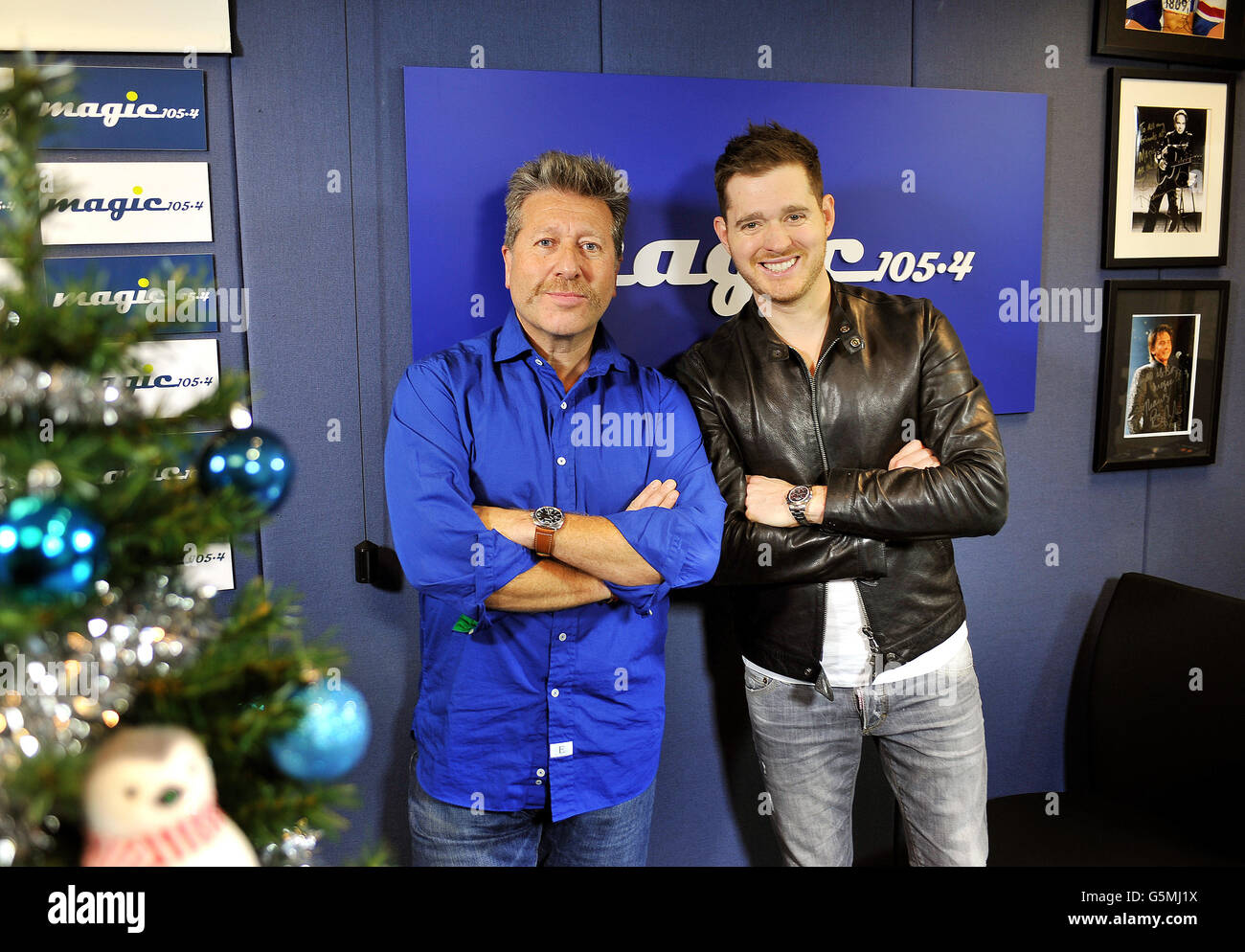 left to right) Magic Radio presenter Neil Fox, with singer Michael Buble in  the Magic Radio studios, in central London, as Buble recorded a session for  four Christmas special shows to be