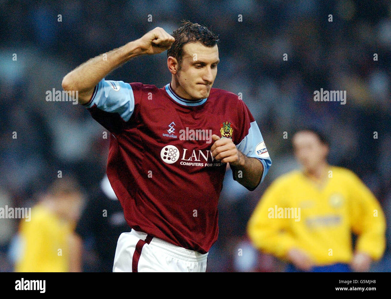 Canvey Island are left dejected as Glen Little celebrates his goal for Burnley, during their AXA FA Cup Third Round match at Burnley's Turf Moor ground. NO UNOFFICIAL CLUB WEBSITE USE. Stock Photo