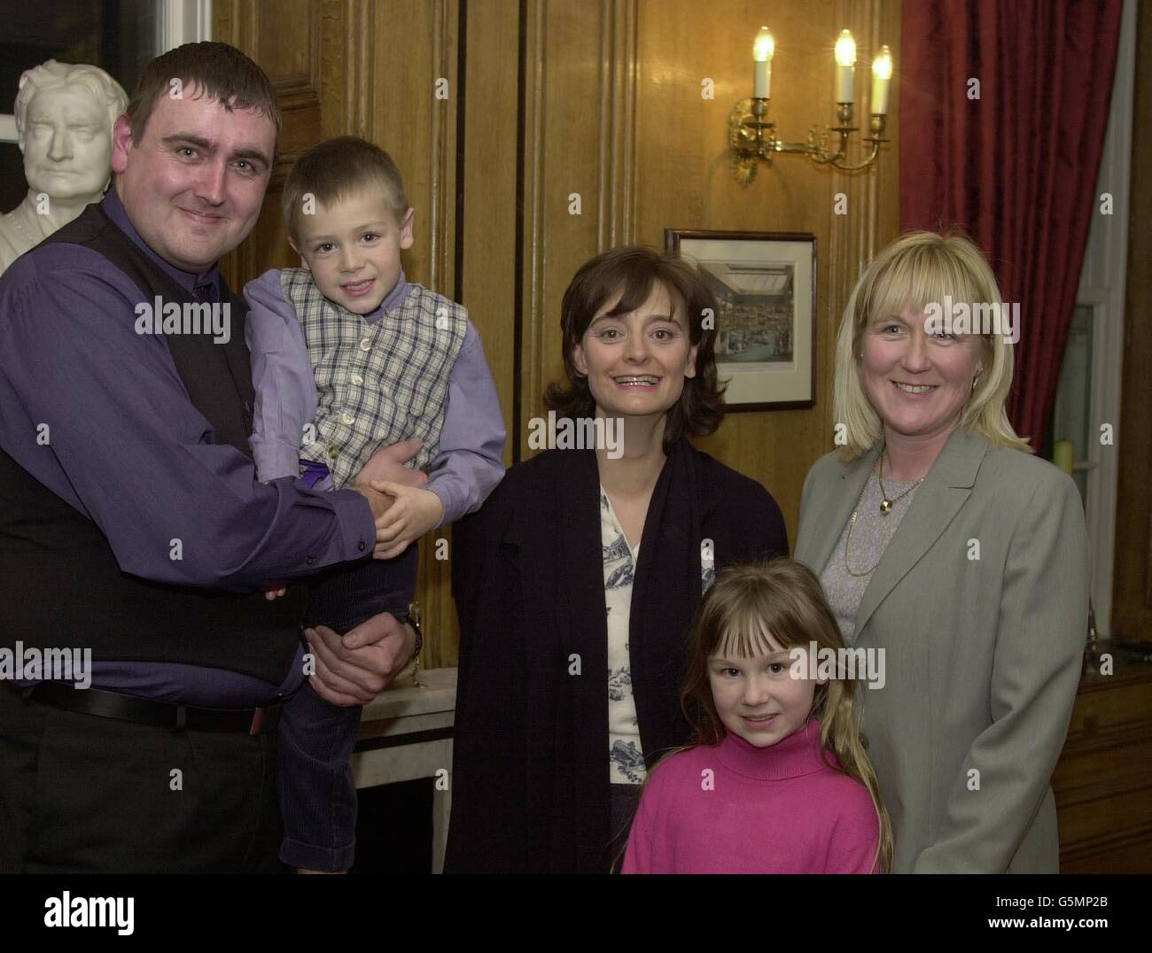 The Prime Minister's wife Cherie Blair with Police widow Mrs Heather Jones, at No.10 Downing Street this evening . PC Steve Jones, was killed while trying to stop a car theft, while serving for the Avon and Somerset Police Force in May 1999. * Mrs Jones took her son Kieran, and daughter Bronwen, and a family friend Mark Jones (left), for tea and chat with Mrs Blair. Stock Photo