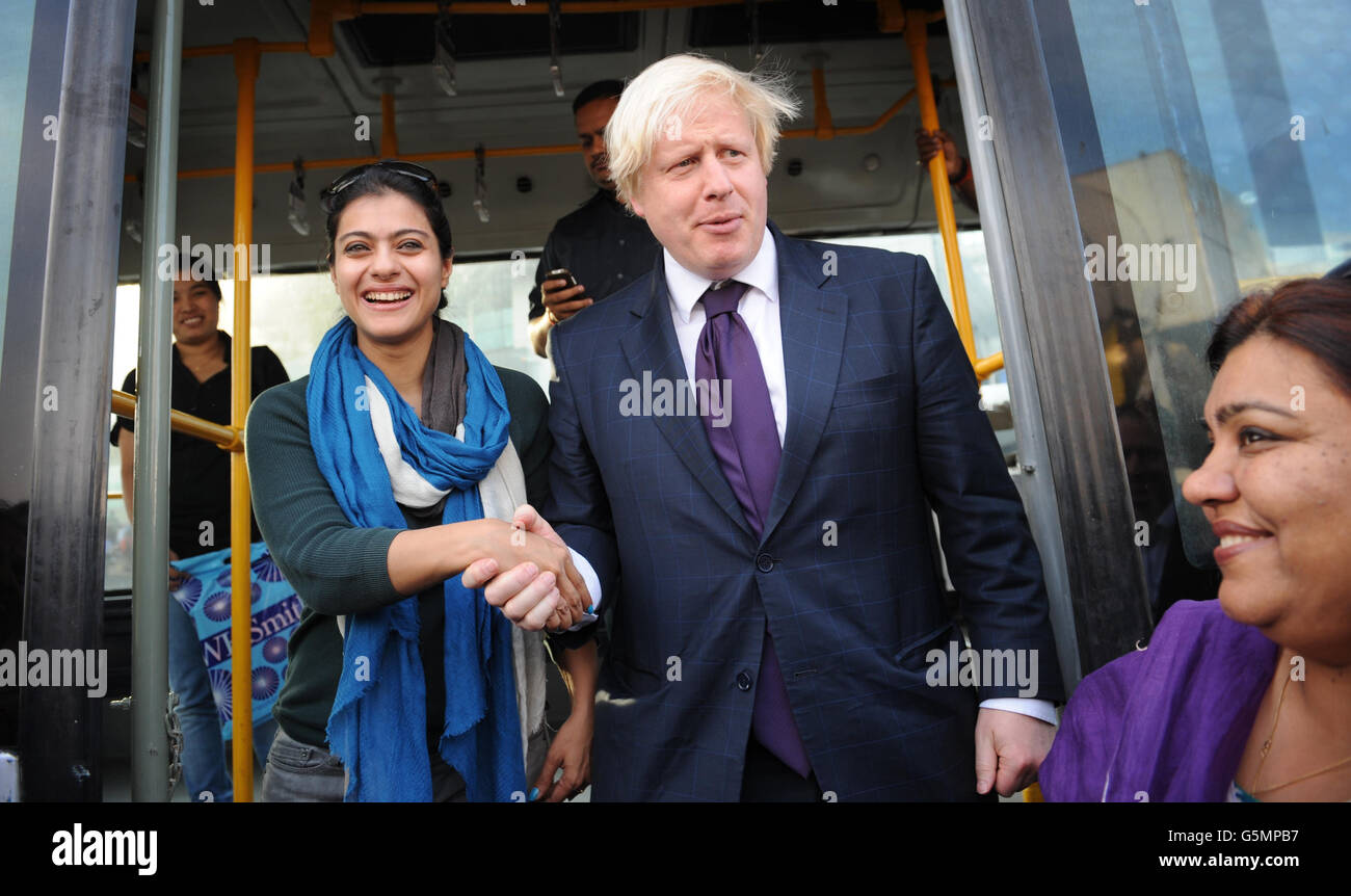 Mayor of London Boris Johnson bumps into Bollywood actress Kajol as he arrives in Mumbai today. The famous Indian actress happened to be on the same flight as the Mayor who was travelling from Hyderabad to Mumbai as part of a week long tour of India where he is trying to persuade Indian businesses to invest in London. Stock Photo