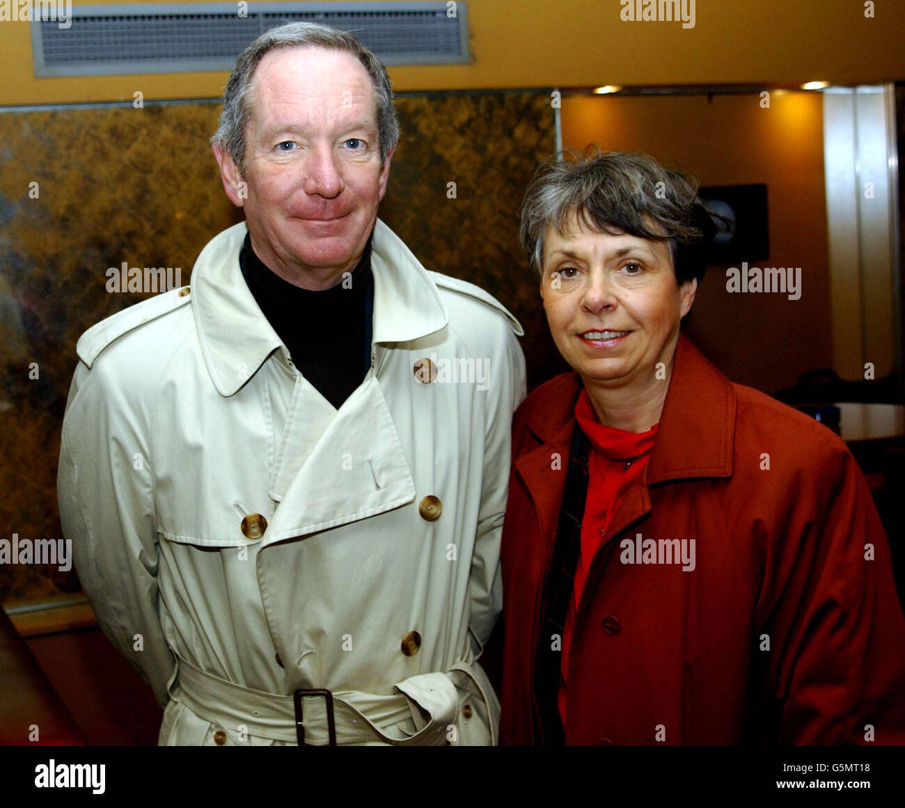 Television newsreader Michael Buerk and his wife Christine arriving at the Curzon Soho cinema in London's Shaftesbury Avenue, for the gala screening of Bloody Sunday. * ... which tells the story of the 1972 killing by British Soldiers of 13 civilians during a civil rights march in the city. Stock Photo