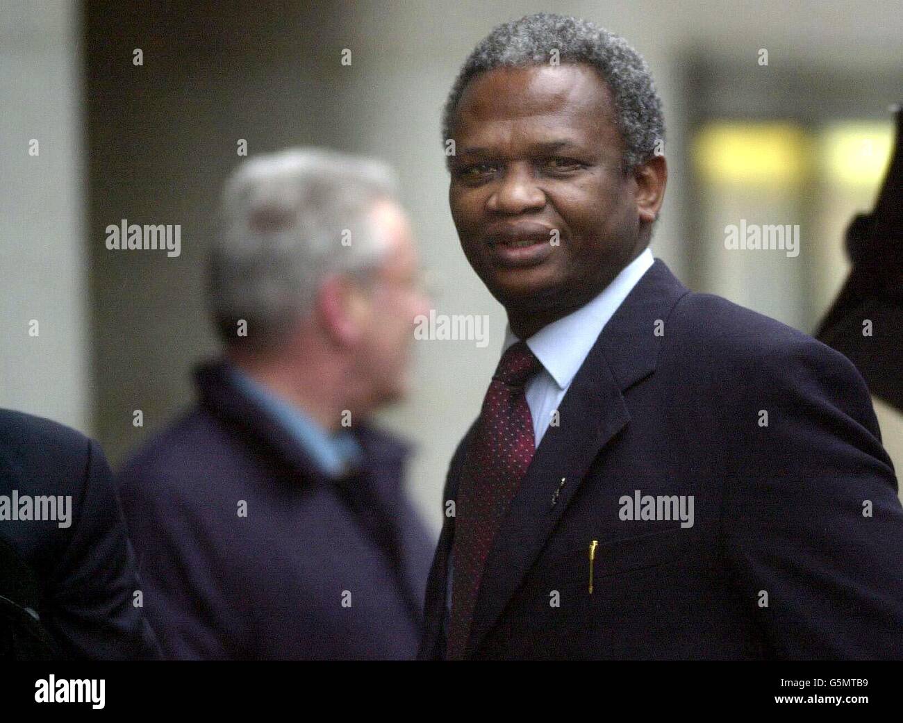 Richard Taylor arrives at the Old Bailey in central London where four teenage boys are accused of murdering his 10-year-old son Damilola. Nigerian-born Damilola was attacked on his way home from an after-school computer class in Peckham, south London. *... on November 27, 2000. He bled to death in a stairwell after he was stabbed in the leg. The trial of the four boys, one aged 14, the others aged 16, will not get under way properly due to legal discussions. Stock Photo