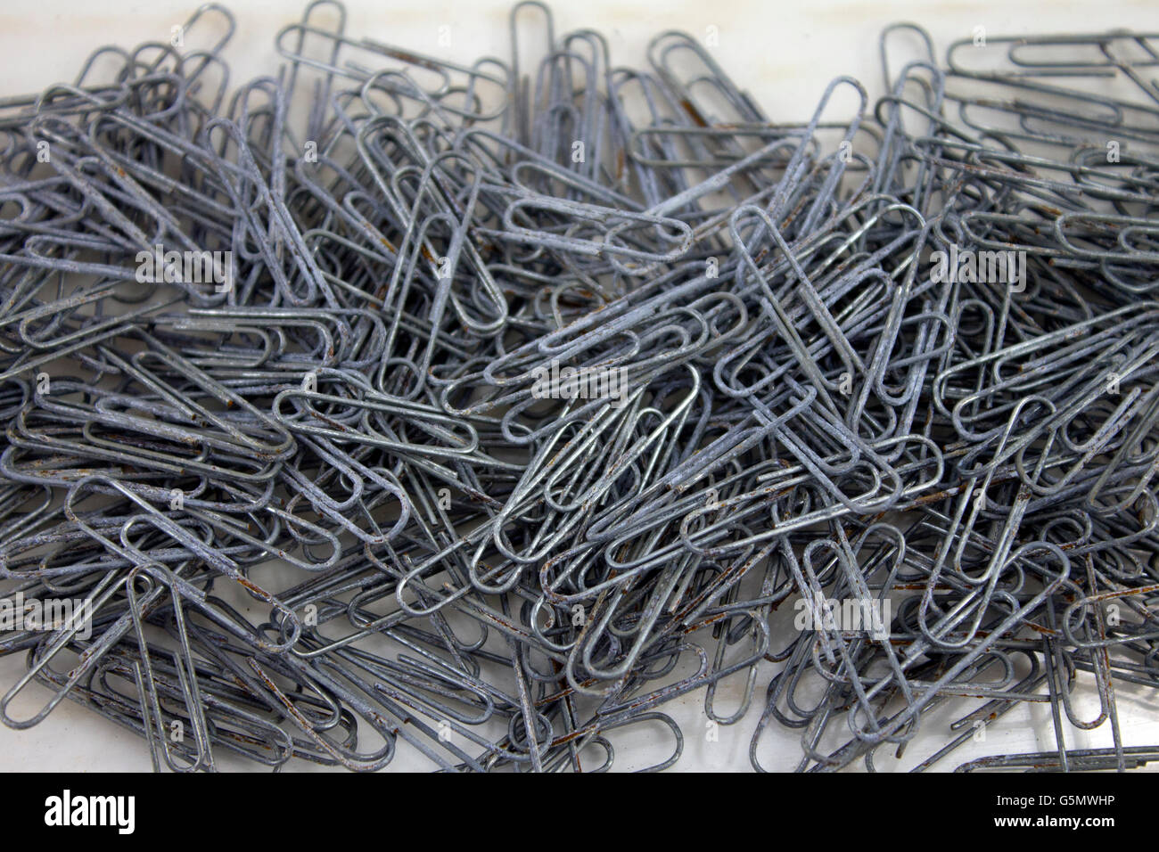 Pile of old paper clips Stock Photo