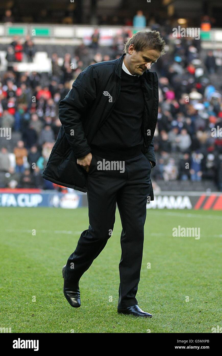 Soccer - FA Cup - Second Round - Milton Keynes Dons v AFC Wimbledon - stadium:mk. AFC Wimbledon manager Neal Ardley appears dejected after the final whistle Stock Photo
