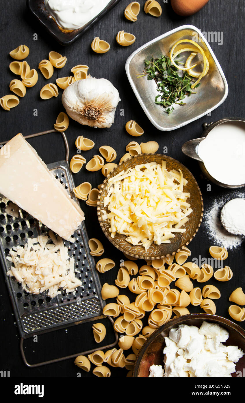 High angle view of cheese and pasta ingredients Stock Photo